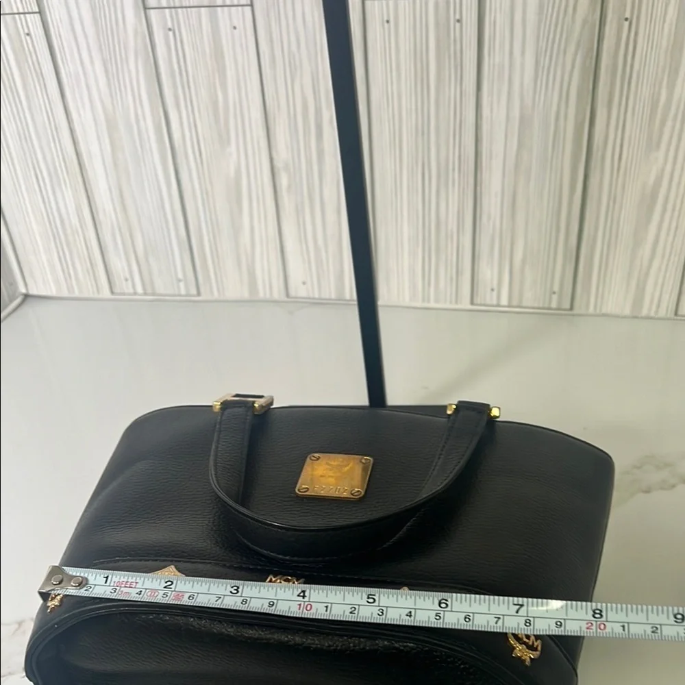 MCM Black Mini Tote with Gold Accents and Trapezoid Shape